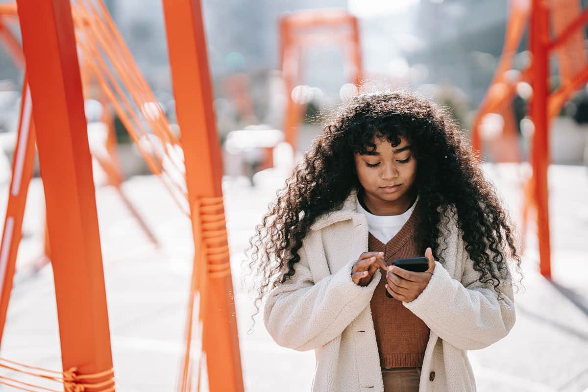 Woman searching the web on her mobile device