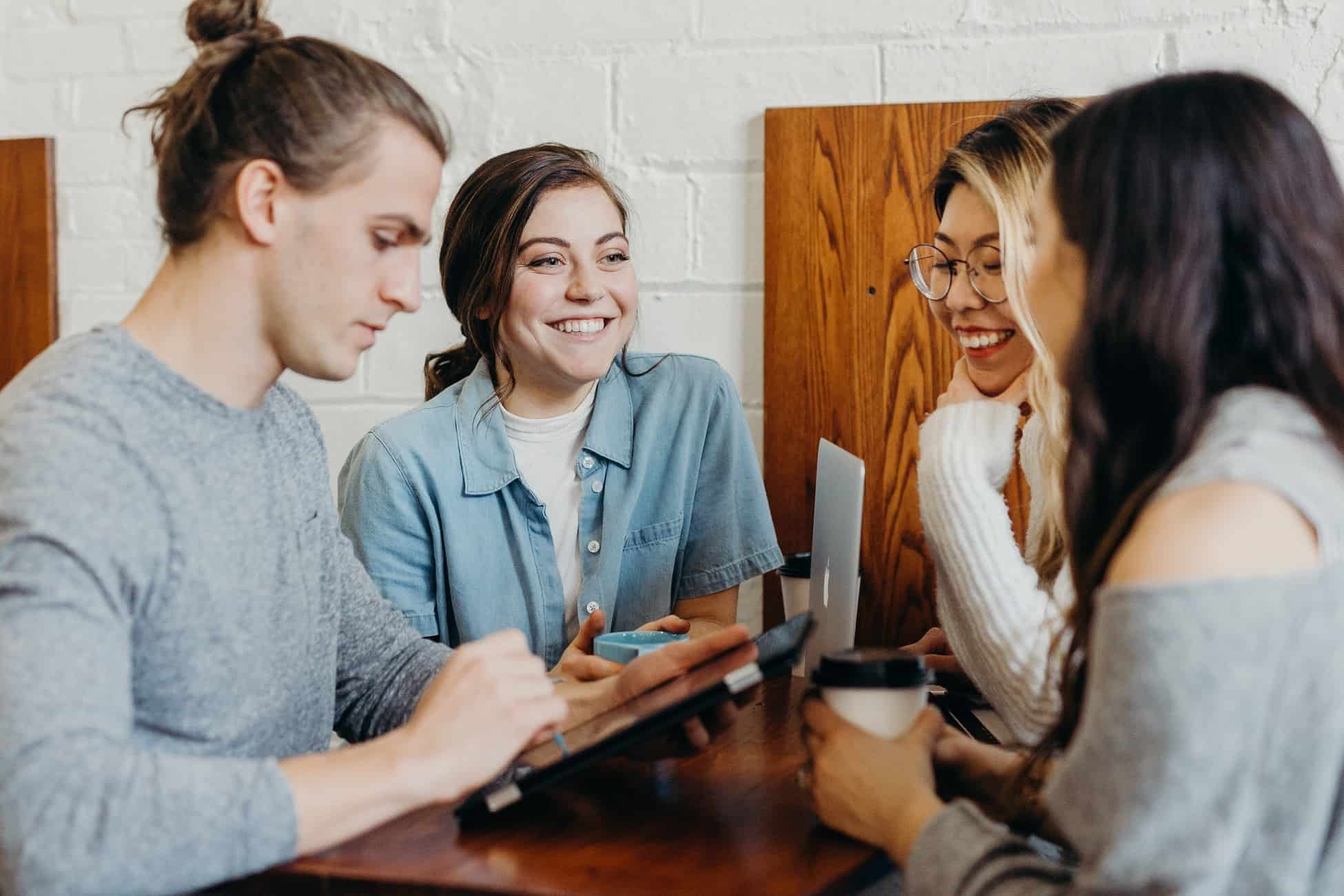 Group of friends talking. Caption: Know who your target demographic is and target them specifically.