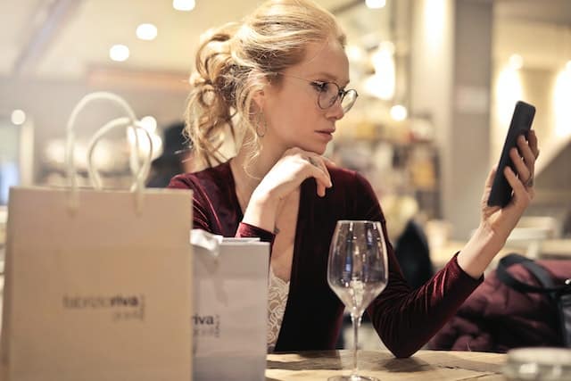 Woman looking at her mobile phone