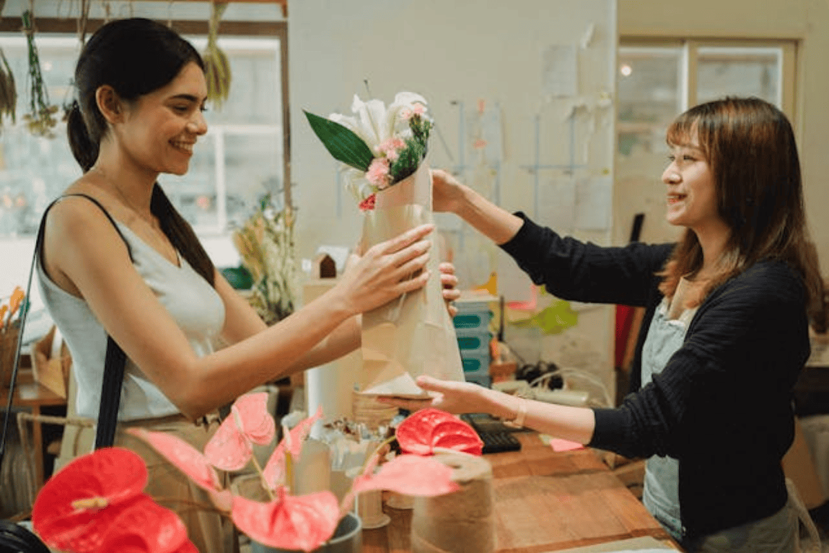 A girl buying a bouquet